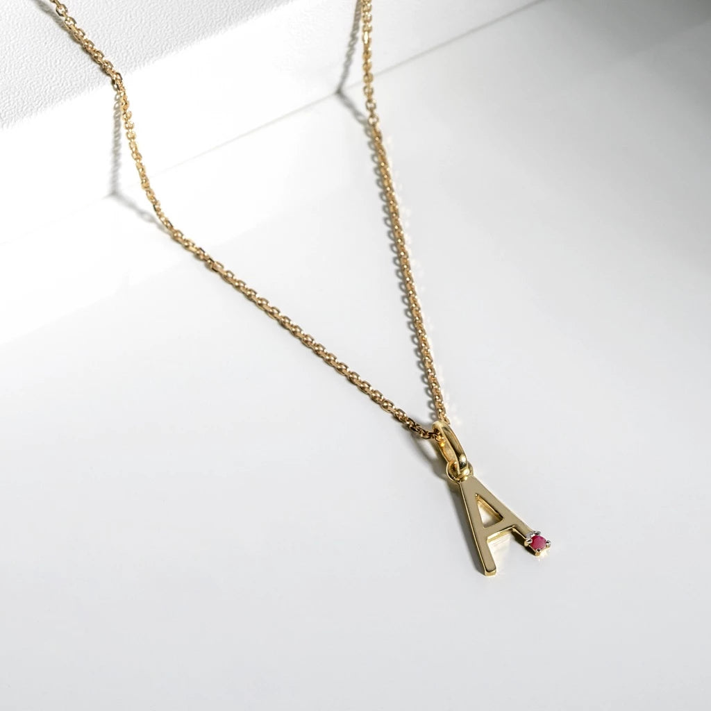 Initial pendants GEMSTONES